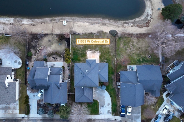 aerial view of property's location featuring nearby suburban area