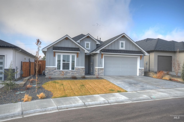 craftsman-style home with a garage