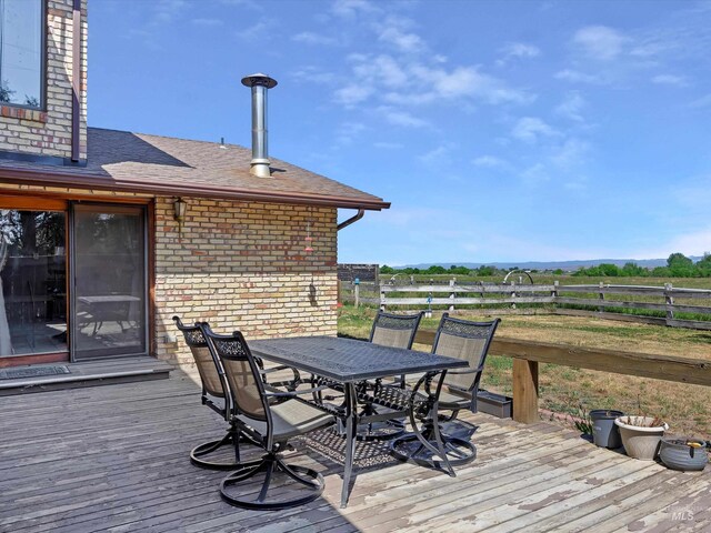 1872 E 1750 S, Gooding, ID 83330 - wooden terrace with outdoor dining area and a view of rural / pastoral area