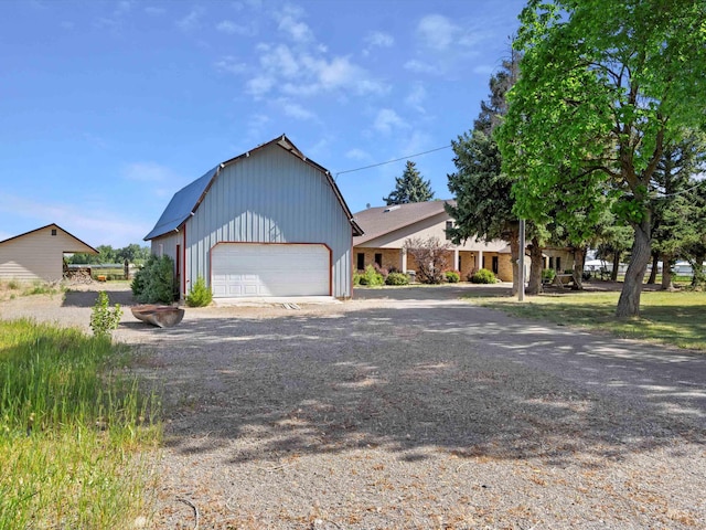1872 E 1750 S, Gooding, ID 83330 - view of front of house with a garage and dirt driveway