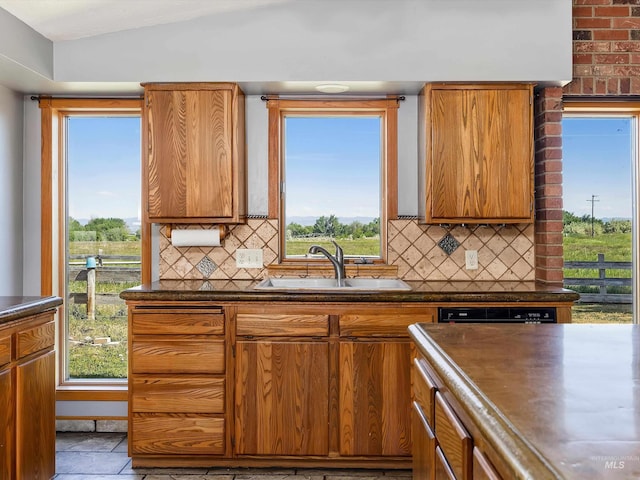 1872 E 1750 S, Gooding, ID 83330 - kitchen featuring a sink, dark countertops, and brown cabinets