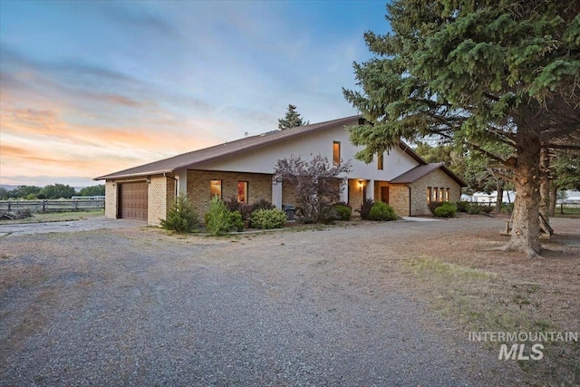 1872 E 1750 S, Gooding, ID 83330 - view of front of house with an attached garage, driveway, and brick siding