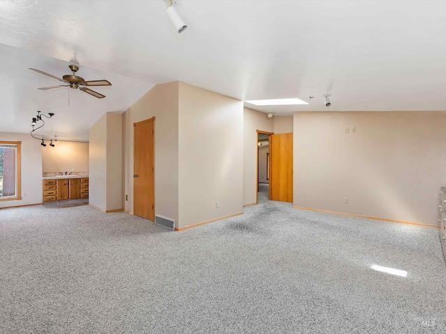 1872 E 1750 S, Gooding, ID 83330 - carpeted empty room with baseboards, ceiling fan, and a sink