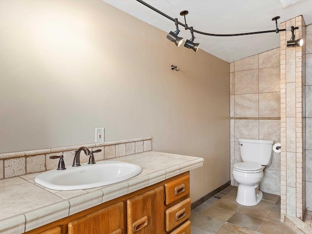 1872 E 1750 S, Gooding, ID 83330 - bathroom featuring toilet, vanity, and tile walls