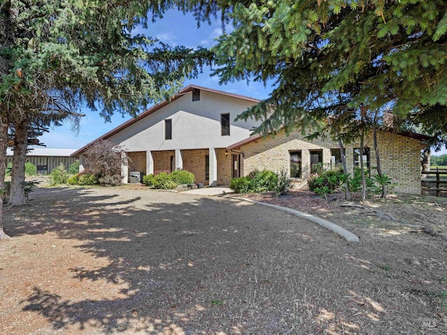 1872 E 1750 S, Gooding, ID 83330 - view of front of house featuring stucco siding and brick siding