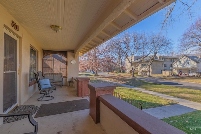 view of patio / terrace featuring a residential view