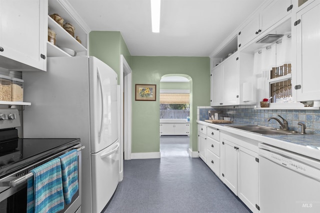 kitchen featuring white cabinets, white dishwasher, stainless steel electric range, open shelves, and a sink