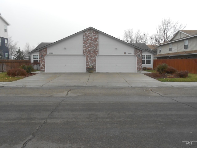 ranch-style home with a garage