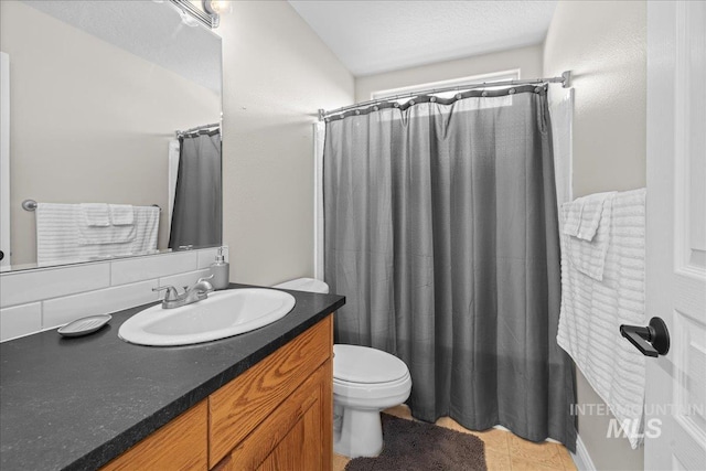 605 W Highland Ave, Nampa, ID 83686 - full bathroom with vanity, tile patterned floors, toilet, and curtained shower