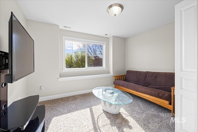 605 W Highland Ave, Nampa, ID 83686 - living area featuring carpet flooring, baseboards, and visible vents