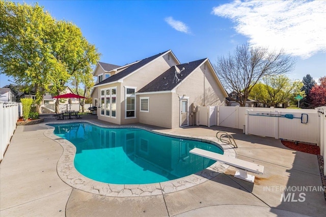 605 W Highland Ave, Nampa, ID 83686 - view of pool with a fenced in pool, a gate, a fenced backyard, and a patio area