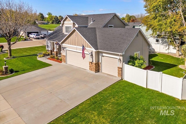 605 W Highland Ave, Nampa, ID 83686 - craftsman-style house featuring fence, an attached garage, board and batten siding, a front yard, and concrete driveway