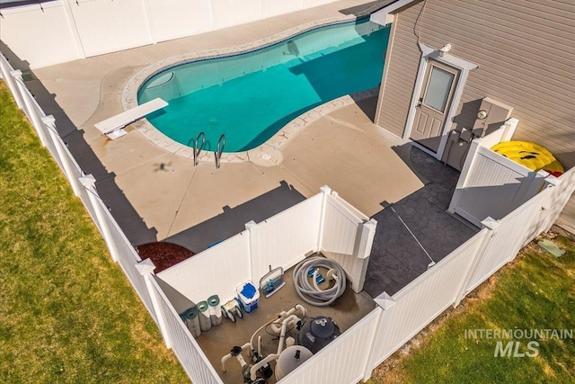 605 W Highland Ave, Nampa, ID 83686 - outdoor pool featuring a diving board and fence