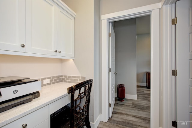 office space with light hardwood / wood-style flooring