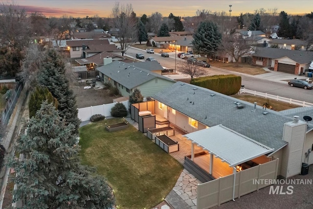 aerial view at dusk with a residential view