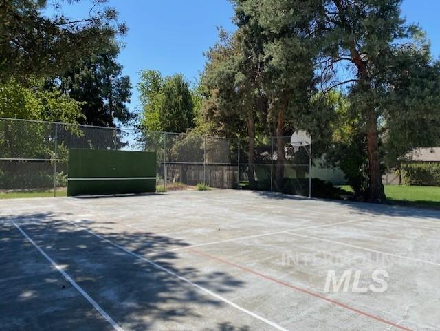 view of sport court with fence and community basketball court