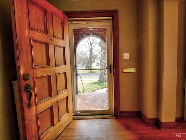 foyer entrance featuring hardwood / wood-style flooring