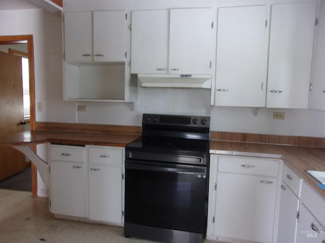 kitchen with under cabinet range hood, white cabinetry, and black range with electric stovetop