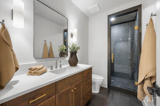 1010 Elo Rd, Mccall, ID 83638 - bathroom featuring vanity, tile patterned floors, and a stall shower