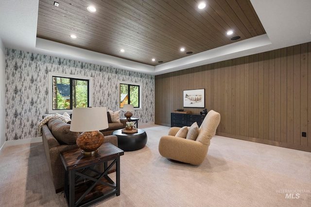 1010 Elo Rd, Mccall, ID 83638 - carpeted living room with wallpapered walls, recessed lighting, wooden ceiling, and a tray ceiling