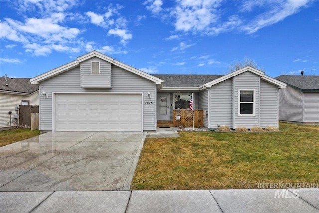 ranch-style home with a front yard and a garage