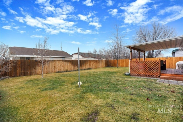 view of yard featuring a deck