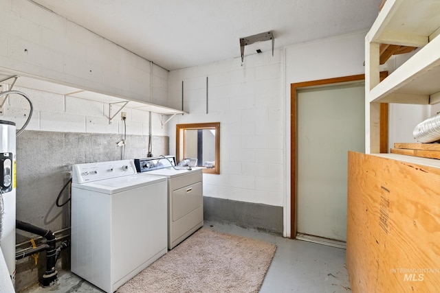 washroom with independent washer and dryer and water heater