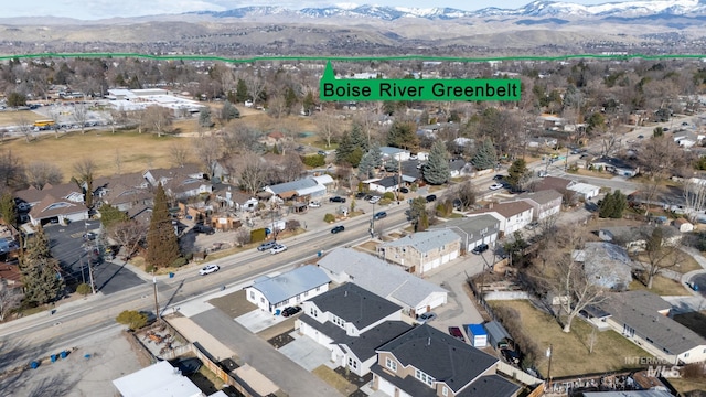 birds eye view of property featuring a residential view and a mountain view