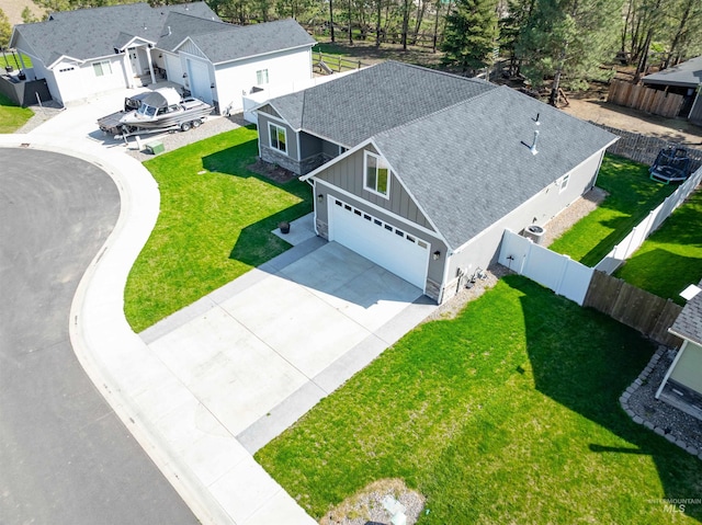 birds eye view of property with a residential view