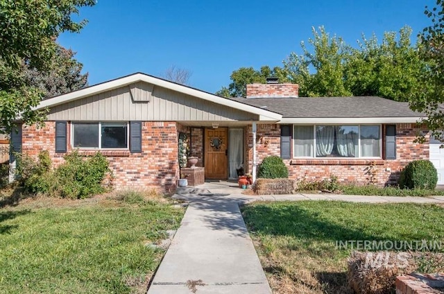 single story home with a front yard