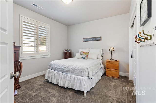 300 S Adventure Way, Kuna, ID 83634 - bedroom featuring dark colored carpet and baseboards