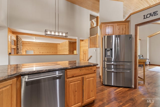 16 Meadow Ln, Boise, ID 83716 - kitchen featuring appliances with stainless steel finishes, dark wood finished floors, and dark stone counters