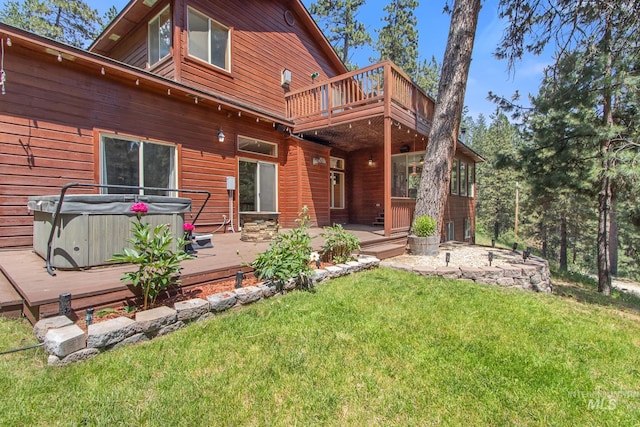 16 Meadow Ln, Boise, ID 83716 - back of house featuring a yard, a deck, and a hot tub
