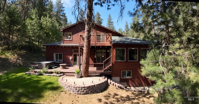 16 Meadow Ln, Boise, ID 83716 - rear view of property featuring a hot tub, a yard, and a deck