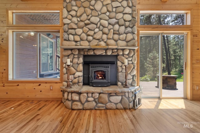 16 Meadow Ln, Boise, ID 83716 - detailed view of wood finished floors, a fireplace, and wood walls