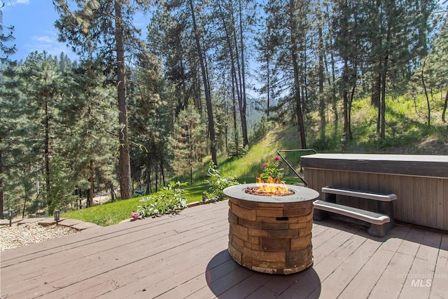 16 Meadow Ln, Boise, ID 83716 - wooden deck featuring a hot tub and an outdoor fire pit