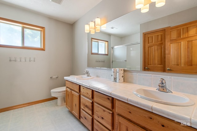 16 Meadow Ln, Boise, ID 83716 - bathroom with a stall shower and double vanity