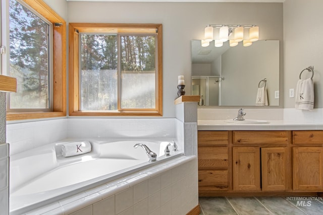 16 Meadow Ln, Boise, ID 83716 - bathroom with vanity, a bath, and a shower stall