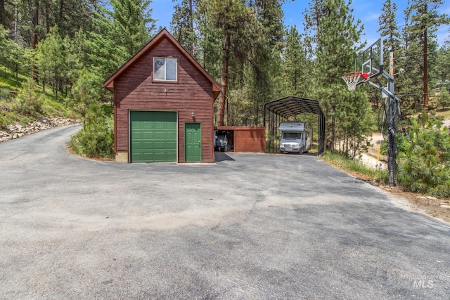 16 Meadow Ln, Boise, ID 83716 - garage with a detached carport, driveway, and a garage