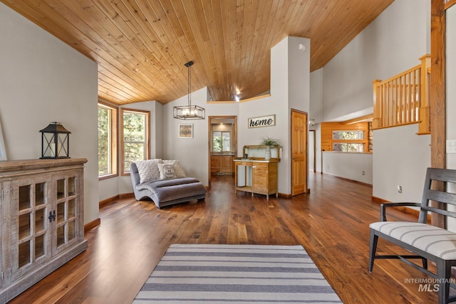 16 Meadow Ln, Boise, ID 83716 - living area with vaulted ceiling, wooden ceiling, dark wood-style flooring, and a chandelier
