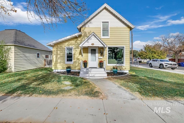 front of property with a front yard