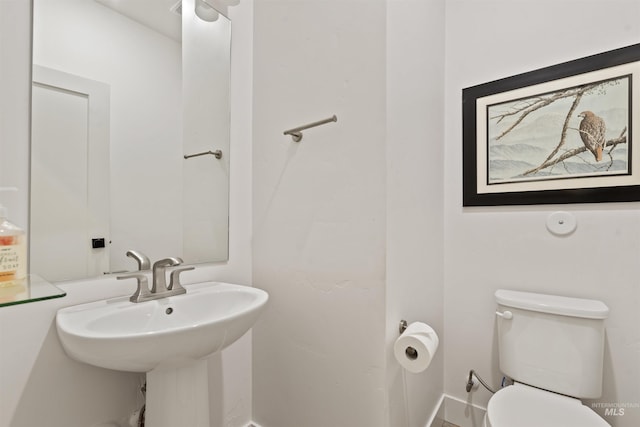 386 E Presidio Ln, Eagle, ID 83616 - half bath with toilet, a sink, and baseboards