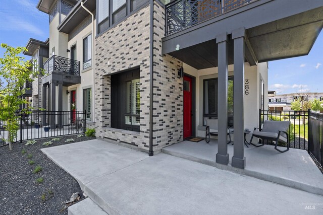 386 E Presidio Ln, Eagle, ID 83616 - view of patio featuring covered porch and a balcony