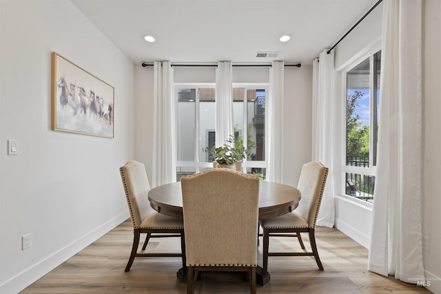 386 E Presidio Ln, Eagle, ID 83616 - dining room featuring light wood-style floors, baseboards, and recessed lighting