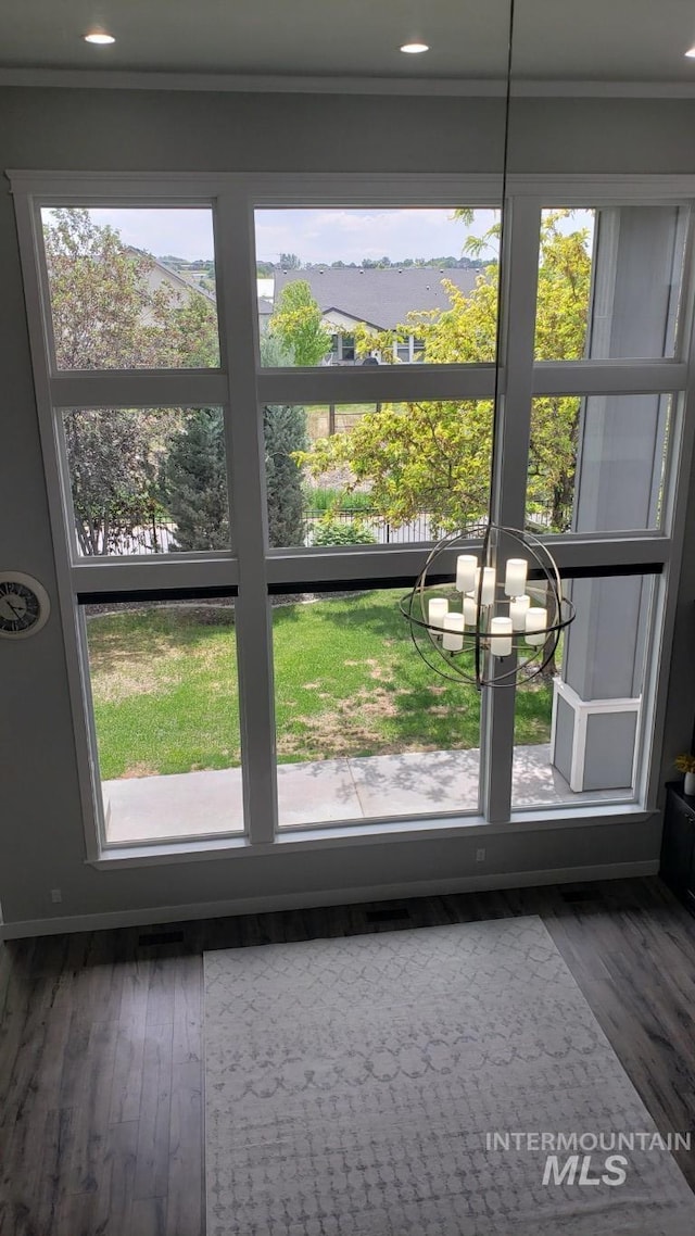 2527 E Taormina Dr, Meridian, ID 83642 - detailed view of wood finished floors, a chandelier, crown molding, and recessed lighting