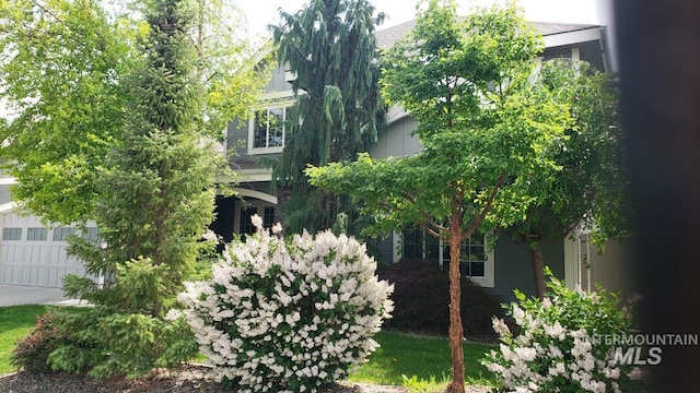 2527 E Taormina Dr, Meridian, ID 83642 - view of side of home featuring board and batten siding