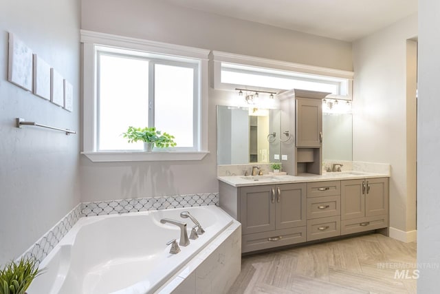 2527 E Taormina Dr, Meridian, ID 83642 - bathroom with double vanity, a bath, and healthy amount of natural light