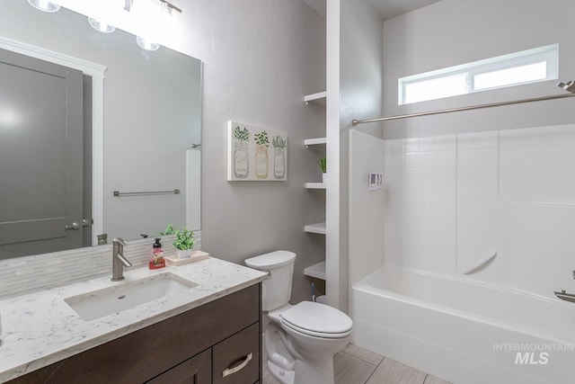 2527 E Taormina Dr, Meridian, ID 83642 - bathroom featuring vanity, toilet, and washtub / shower combination