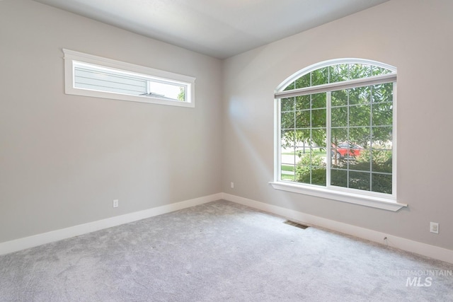 2527 E Taormina Dr, Meridian, ID 83642 - carpeted empty room with baseboards