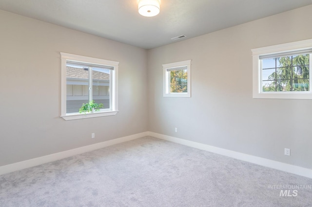 2527 E Taormina Dr, Meridian, ID 83642 - carpeted spare room featuring baseboards